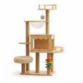 Lune multi-level cat tree with plush donut bed in natural wood on a white background | The Fernby