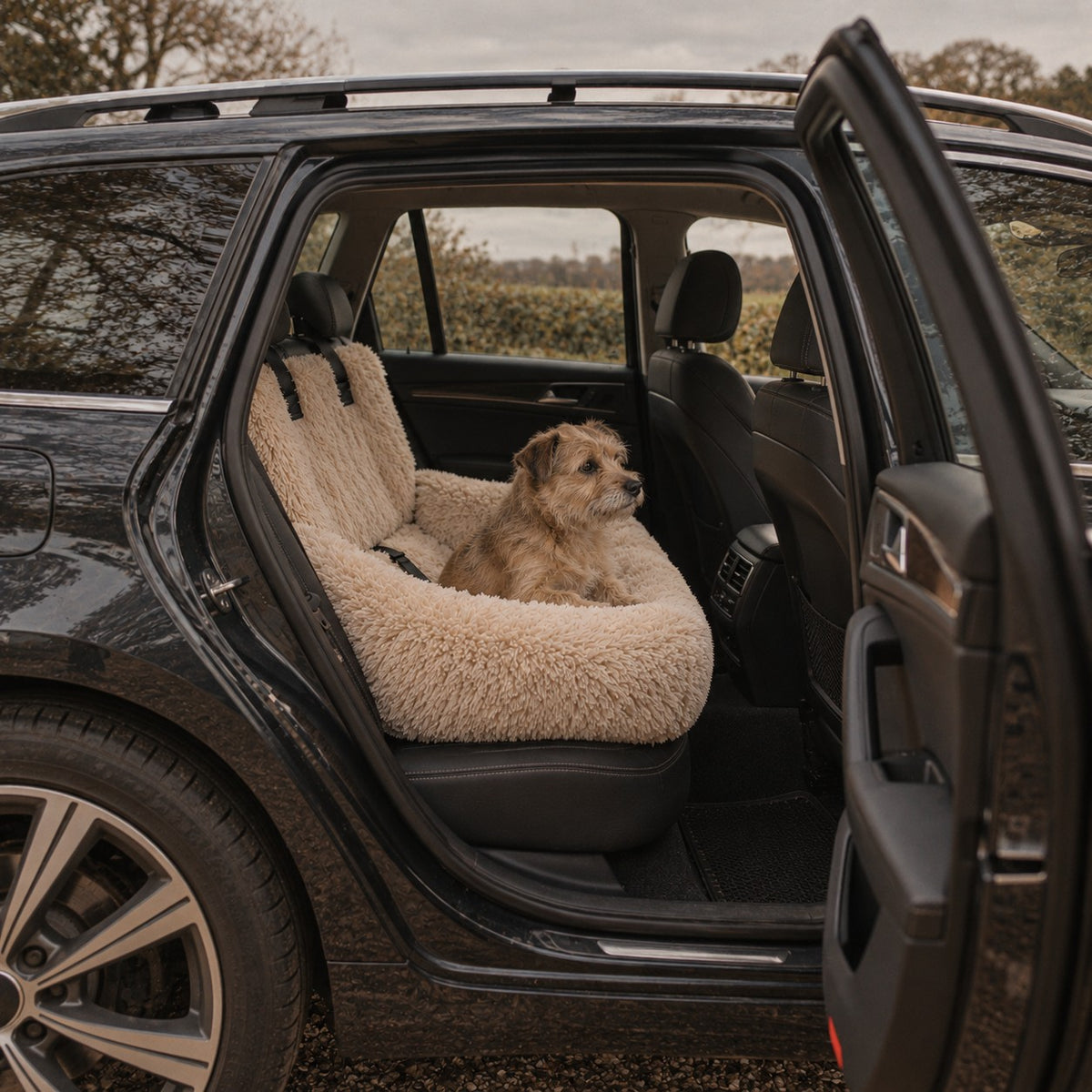 Verney raised dog car bed in use on a car back seat | The Fernby